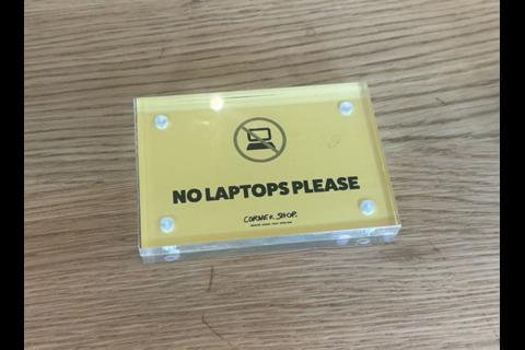No laptops sign at Corner Shop
